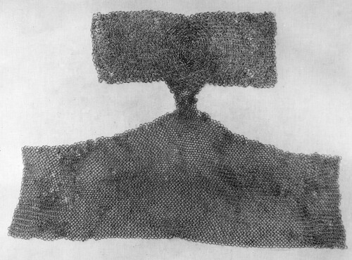 From about the third century B.C. through the early fourteenth century A.D., mail, also called chain mail, was the predominant and most effective type of body armor known in Europe. From about the mid-fifteenth century onward, mail was used in conjunction with full plate armor to fill the gaps between plates.

Separate mail sleeves were made to be worn with a cuirass (breastplate and backplate); shaped panels of mail called gussets, covered the armpits or the crooks of the elbows and were attached to arming jackets, garments specially tailored to be worn under armor; and mail breeches, called brayettes or pairs of paunces, could be worn by men fighting on foot.